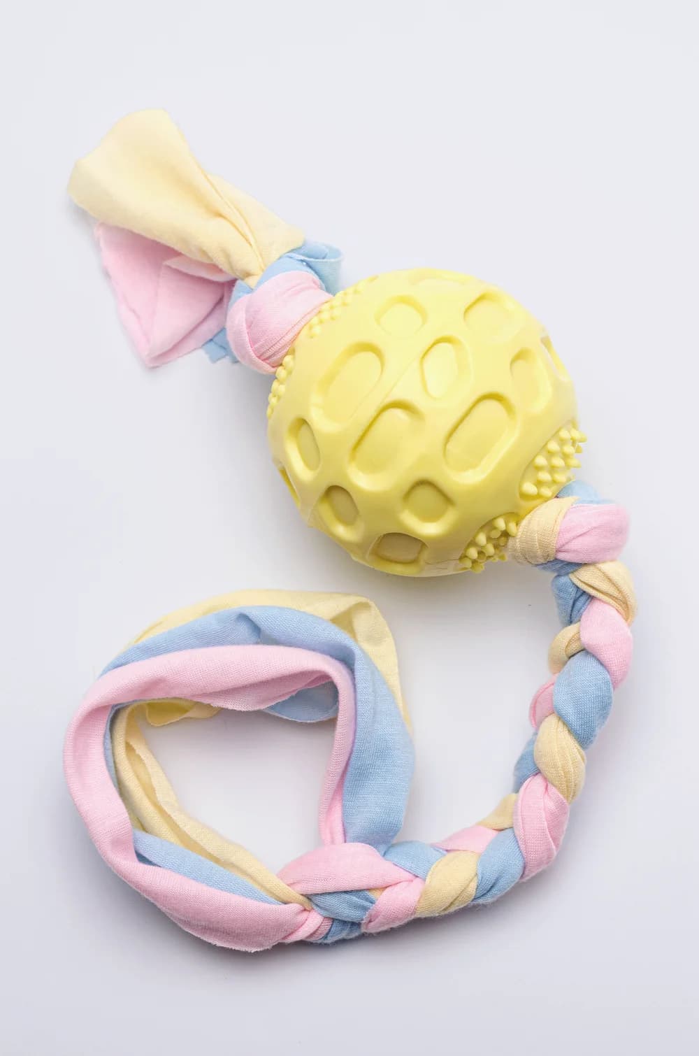 Жовтий гумовий м'ячик для собак з канатиком (38х7.5см)